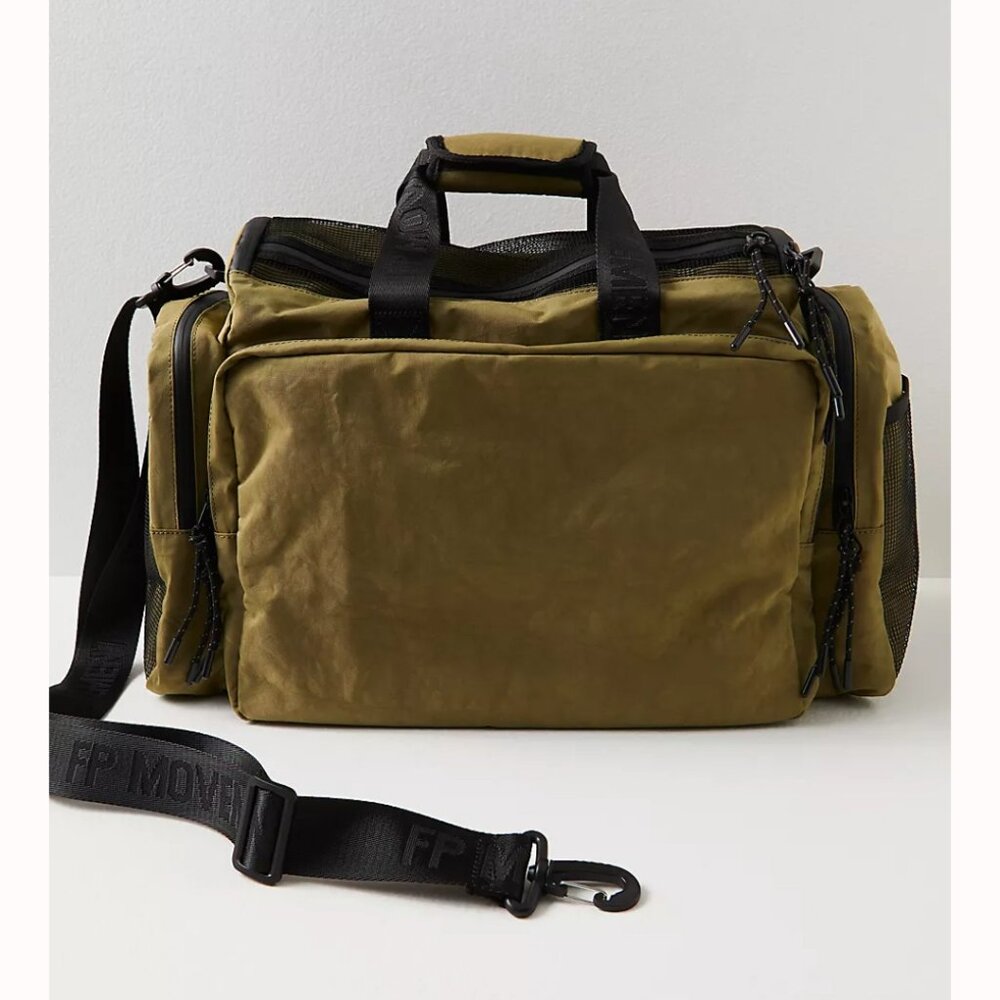 Large olive green duffle bag by Free People